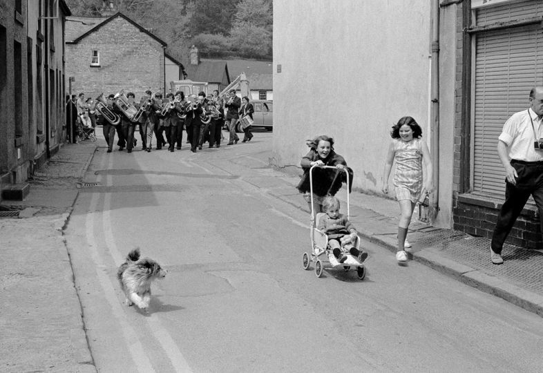 G.B. WALES. 1973. Llanidloes. The local brass band lead the last Civic Parade to be held in Llanidloes. © David Hurn / Magnum Photos - Courtesy RRB PhotoBooks