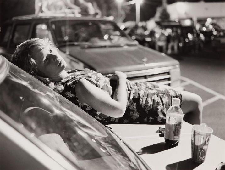 Mark Steinmetz (American, born 1961), Girl on Car, Athens, GA, 1996, gelatin silver print, High Museum of Art, Atlanta, purchase with funds from the Friends of Photography, 2017.305. © Mark Steinmetz.