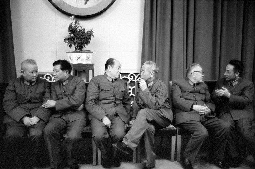 6 PLA regional commanders chit chatting behind the curtain at the Great Hall of People, awaiting for the State banquet to honour US secretary of Defence, Harold Brown, Beijing, 1978. © HS Liu 