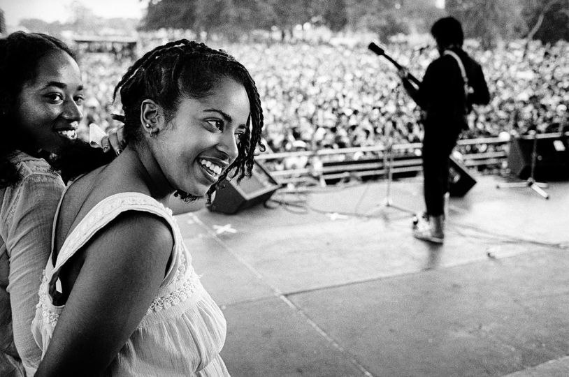 Girls on stage while Aswad, the British Reggae Band, performs on stage at the Anti Nazi League / Rock Against Racism Concert in Brockwell Park. London Sptember 1978 © Mark Abrahams © Mark Abrahams - Courtesy of Bluecoat Press