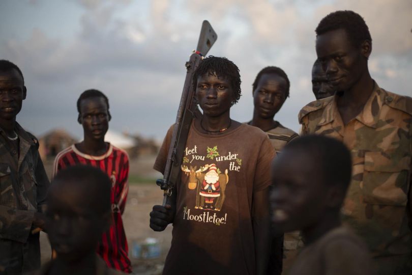 In Yuai village, Uror county, Jonglei state, South Sudan, the youth from Lou Nuer tribe are coming home after fighting against the rebel group of Yau Yau, in Pibor county, South Sudan on July 23rd 2013. Camille Lepage / AFP Photo - Courtesy Manuel Rivera-Ortiz Foundation