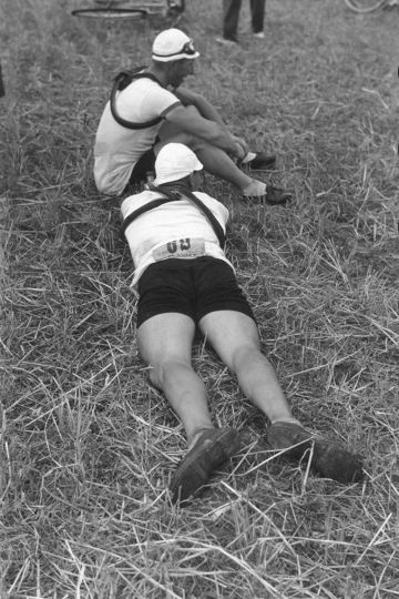 Cyclists resting between laps, Tour de France 1935. © Robert Capa © International Center of Photography/Magnum Photos
