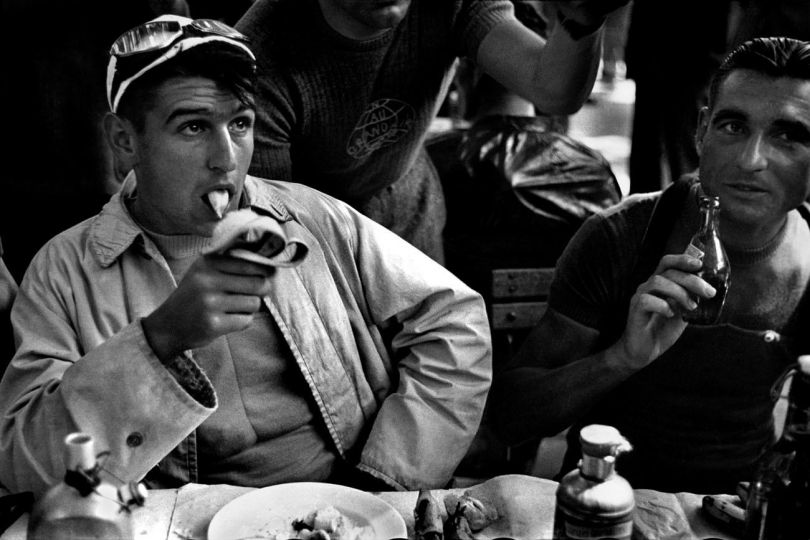 A refreshment break for the cyclists and their maintenance team, Tour de France 1935. © Robert Capa © International Center of Photography/Magnum Photos