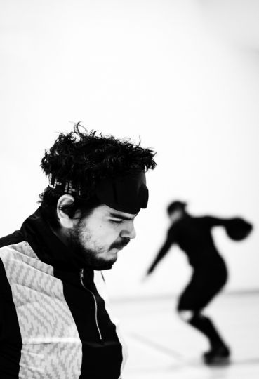 At goalball training, Montreal (Canada), December 1st 2023. Braxton attends his goalball training provided by the Quebec Association of Blind Sports. He focuses on listening to the ball. Goalball is a Paralympic sport created after World War II to aid visually impaired soldiers in their rehabilitation. © Ophélie Chauvin