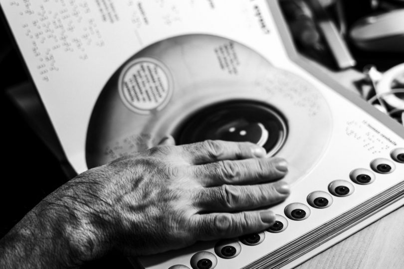 Montreal (Canada), December 10th 2023, at Marc-Andre’s place. Marc-André showed me a Braille book for children. With the digital shift, Braille is on the decline, replaced by adapted audio software. © Ophélie Chauvin