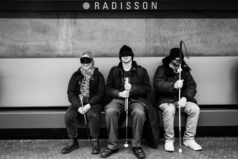 Radisson subway station, Montreal (Canada), November 25th 2023, at a raining session to learn how to guide blind persons. In Quebec, there are nearly 100,000 visually impaired individuals, with the vast majority living below the poverty line. Organizations like the Quebec Foundation for the Blind work to alleviate the poverty and isolation experienced by blind individuals, as well as to enhance social and community integration. Each year, the Foundation expands the boundaries of accessibility by offering a wide range of sporting and recreational activities, including tandem cycling, music and cooking lessons, and hang-gliding, among others. While over 80% of the information we receive is visual, these activities are crucial in aiding the development of social and cognitive skills, particularly in younger children. © Ophélie Chauvin