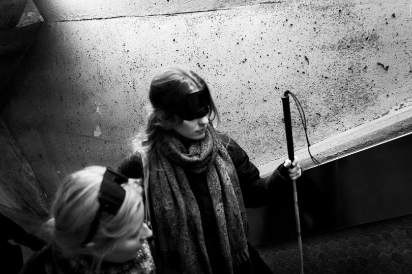 Radisson subway station, Montreal (Canada), November 25th 2023. Annette et Alexandra, are future ski instructors for blind individuals. They are attending a training session (provided by the Quebec Foundation for the Blind ) to learn how to guide them. In pairs, one of the participant put into practice the guiding techniques, while the other experiences “the world of“ the visual-impaired. © Ophélie Chauvin