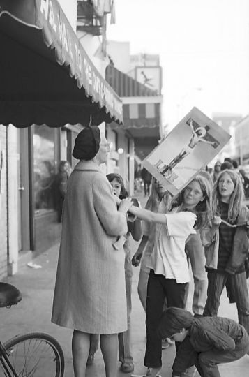 Kids Take Womans Sign © Mark Woods
