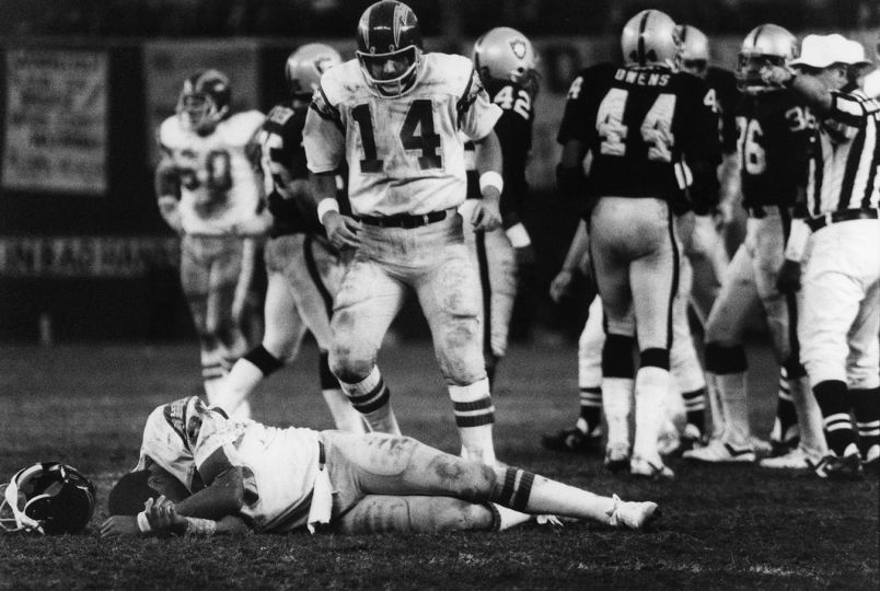 Michael Zagaris - Dan Fouts (#14) Checks on Kellen Winslow (#80) of the San Diego Chargers During a Game Against the Oakland Raiders in the AFC Championship Game, 1981 © Michael Zagaris